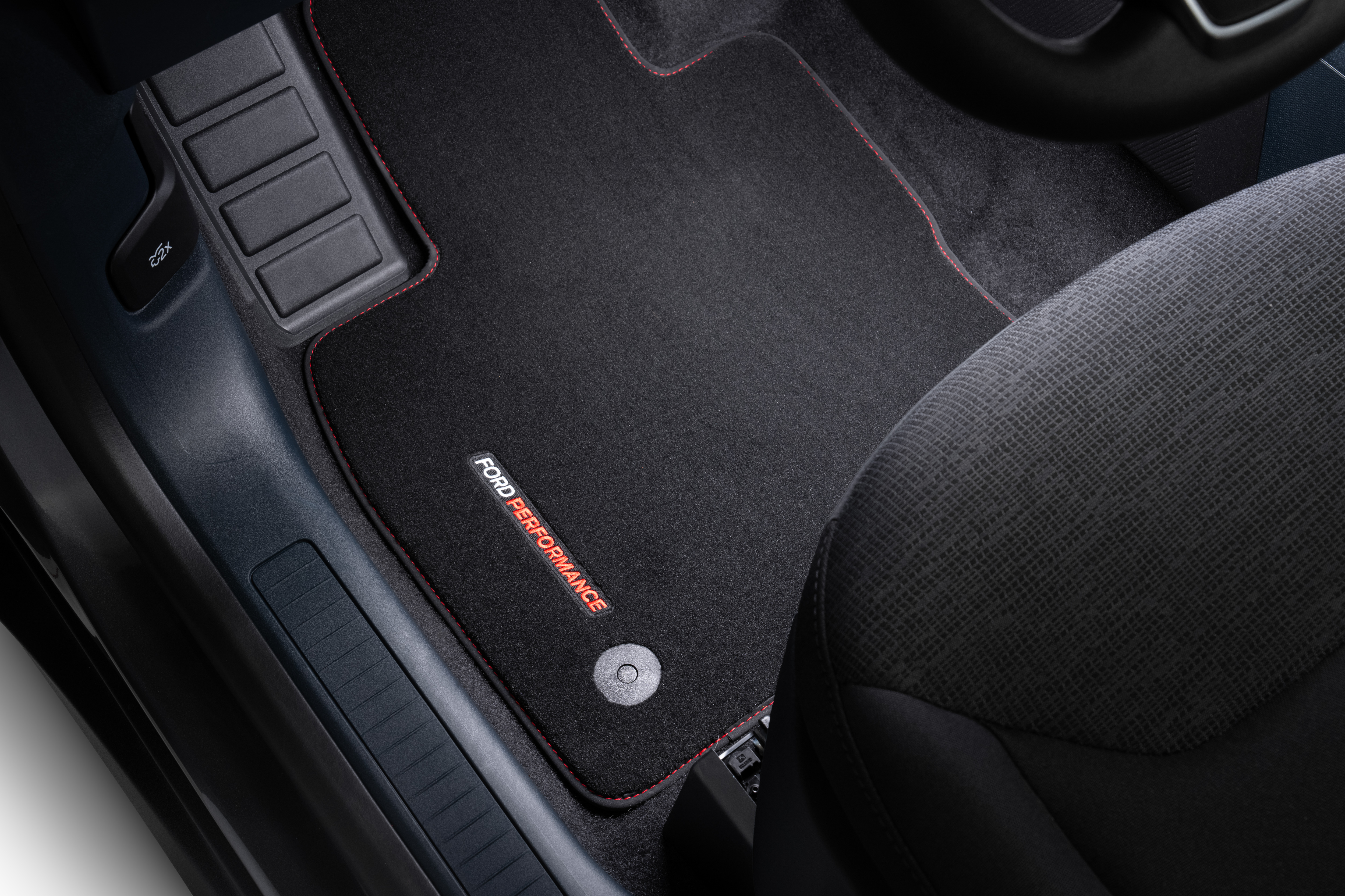 Floor mats in Ford Maverick 300T show "Ford Performance" label
